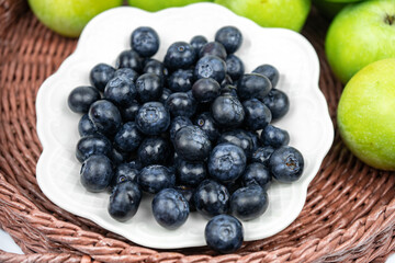 Group of fresh ripe blueberries on white background