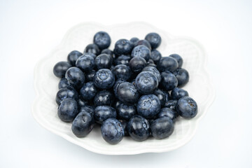 Group of fresh ripe blueberries on white background