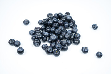 Group of fresh ripe blueberries on white background