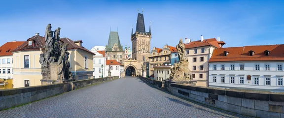 Wall murals Charles Bridge Amazing Sunny day on Charles bridge and historical center of Prague, buildings and landmarks of old town, Prague, Czech Republic Prague during quarantine restrictions. Spring or summer time.
