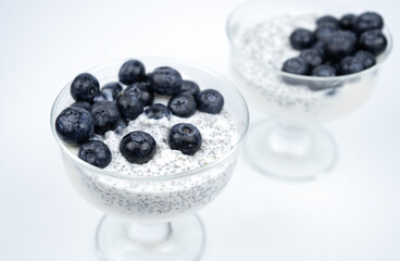 Healthy breakfast with yogurt, chia seeds and blueberry. Vegan food