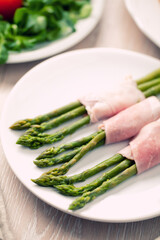 Ham rolls with asparagus. High quality photo.