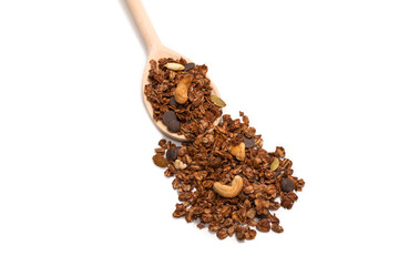 Chocolate granola cereal with nuts in a wooden spoon.