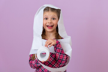 The girl smiles broadly and holds a soft toilet paper.