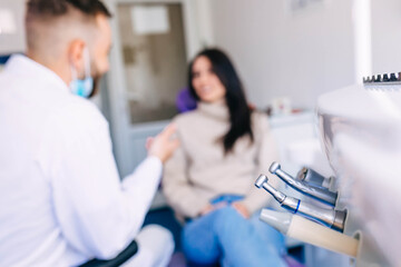 the dentist and the patient interact with each other in the dent
