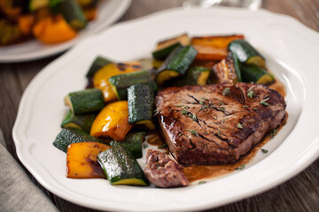 Fillet of beef with mixed vegetables. High quality photo.