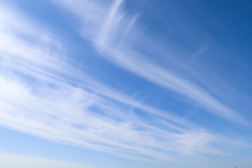 Beautiful fluffy white clouds in blue sky