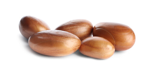 Many raw jackfruit seeds on white background