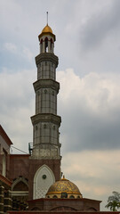 one of the minarets in the golden dome mosque