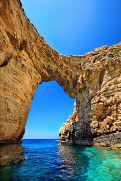 Trypitos (also known as "Kamara"), a natural rocky arch at Paxos ("Paxi") island, Ionian Sea, Eptanisa ("Seven Islands"), GREECE. Paxos island belongs to Kerkyra ("Corfu") prefecture.