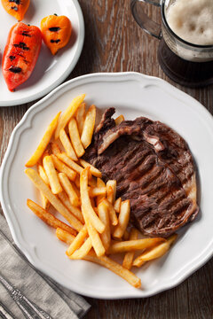 Beef steak with French fries. High quality photo.