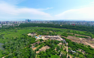 Fototapeta na wymiar Panoramic view of Moscow on a sunny day, Russia. Picturesque region in the north-west of Moscow city. Terekhovo metro station site