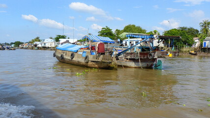 Fototapeta na wymiar Boote im Mekong Delta in Vietnam