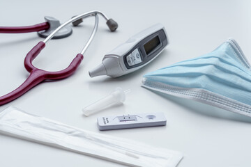 Sars Covid 19 Rapid Antigentest with Mask, Clinical Thermometer and Stethoscope. Negative Corona Test
