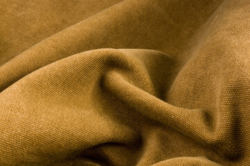 clothing items stonewashed cotton fabric texture with seams, clasps, buttons and rivets, macro