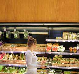 Woman buying fruits at the market