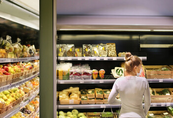 Woman buying fruits at the market