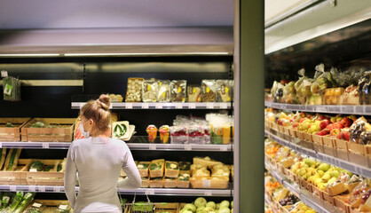 Woman buying fruits at the market