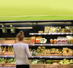 Woman buying fruits at the market