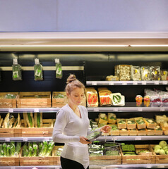 Woman buying fruits at the market