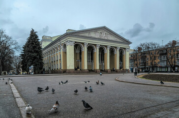 Poltava, Ukraine - April 14, 2021: Majestic antique columns of the ancient facade of the building...