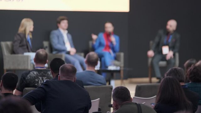 Audience listens to the lecturer