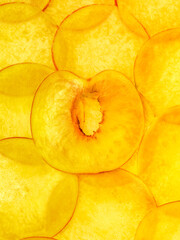 texture of thin peach slices backlit illuminated