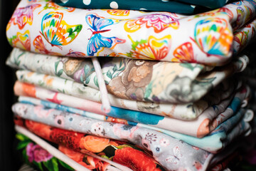 colorful fabrics for sale at market