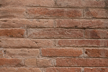 Texture of a orange brick wall. Close up