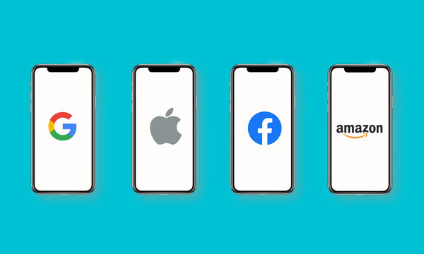Los Angeles, California, USA - 15 April 2021 GAFA icons on smartphone screens with blue background banner - Google, Apple, Facebook, Amazon