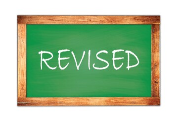Fototapeta premium REVISED text written on green school board.