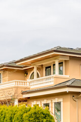The top of the house or apartment building with nice window.