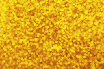glittering background of golden sequins closeup. Sparkle festive texture