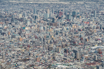 Fototapeta na wymiar Sapporo City, a city skyline and aerial view of the largest city in Hokkaido, Japan.