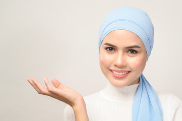 close up of young beautiful muslim woman with hijab isolated on white background studio, muslim...