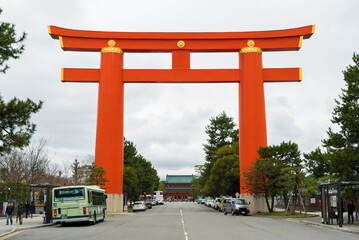 Giant red Japanese Torii gate in Kyoto, Japan. Culturally religious symbol of the Japanese Shinto...
