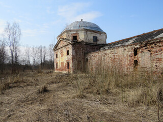 An old abandoned building on a sunny day.