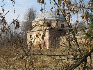 An old abandoned building on a sunny day.