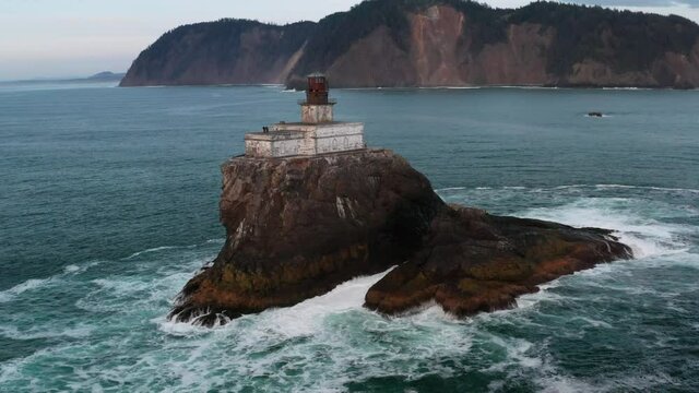 Aerial 4K of Oregon Coast Lighthouse Over Crashing Waves featuring Tillamook Rock Terrible Tilly Pacific Northwest