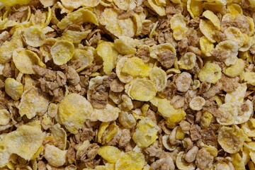 Dry breakfast cereal whole grains, granola and oat flakes concept background image.