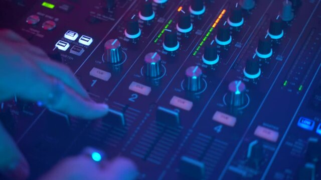 Dj uses console, stroboscopic light and smoke, gimbal 4k shot