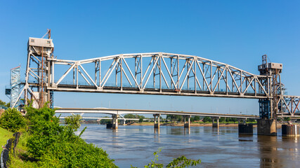 Junction Bridge over Arkansas River in Little Rock, Arkansas, USA. Historic railroad bridge, converted to a pedestrian and bicycle bridge in downtown Little Rock.