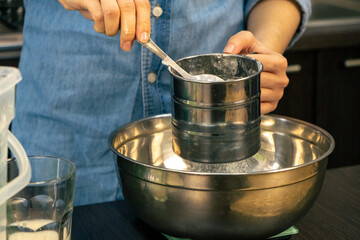 woman cooking with flour