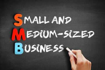 Fototapeta premium SMB - Small and Medium-Sized Business acronym on blackboard