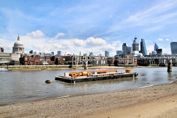 A view of St Pauls Cathedral across th river Thames