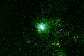 A beautiful, bright green nebula. Elements of this image were furnished by NASA.