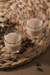 Short glasses of Irish cream Liquor or Coffee Liqueur with coffee beans