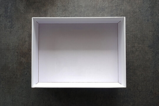 Empty White Box Bottom against a Gray Background