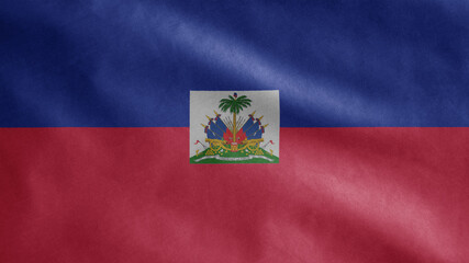 Haitian flag waving in the wind. Close up of Haiti banner blowing soft silk.