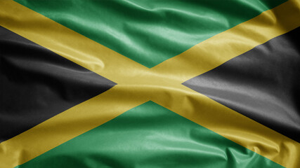 Jamaican flag waving in the wind. Jamaica banner blowing soft silk.
